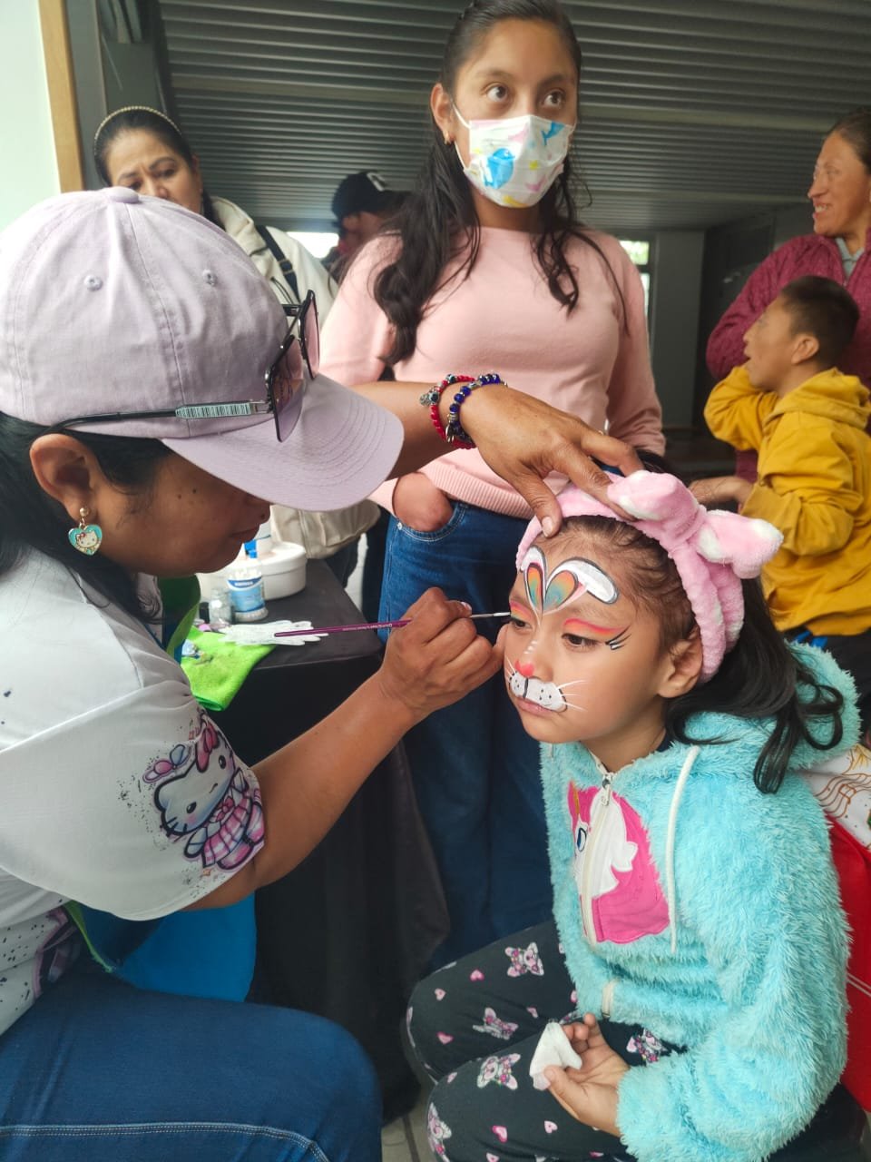 Pintucaritas para los niños de la comunidad PKU
